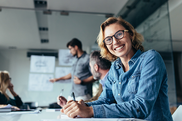 Smiling woman at a meeting