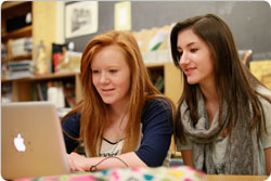 Two girls at laptop